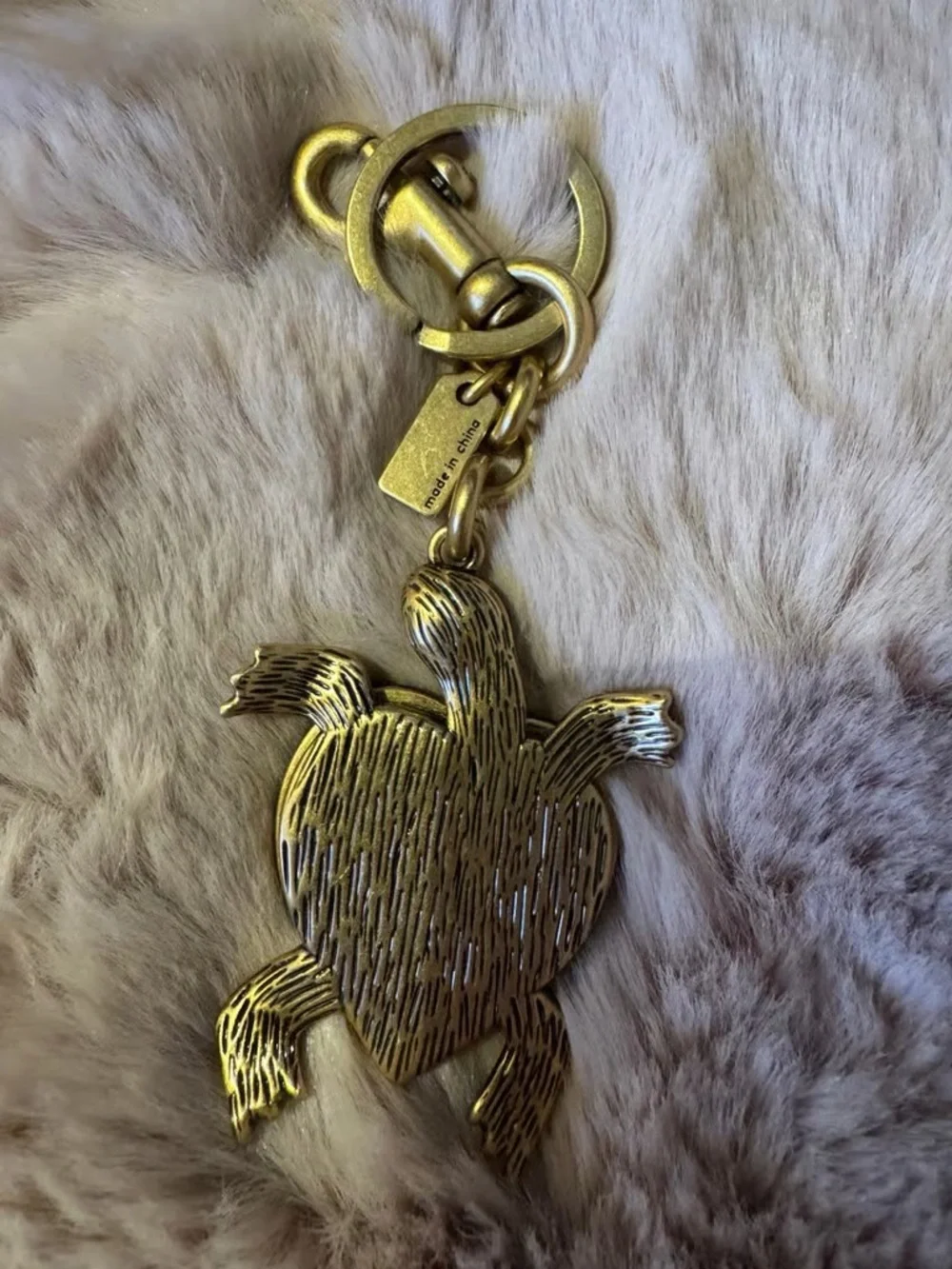 COACH Gold-Tone Turtle Heart Keychain with Brown Enamel